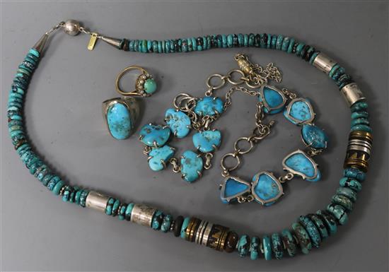 A group of assorted turquoise set jewellery comprising two rings, a bracelet and two necklaces.